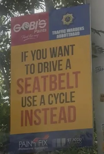 A driver safety sign with a confusing translation